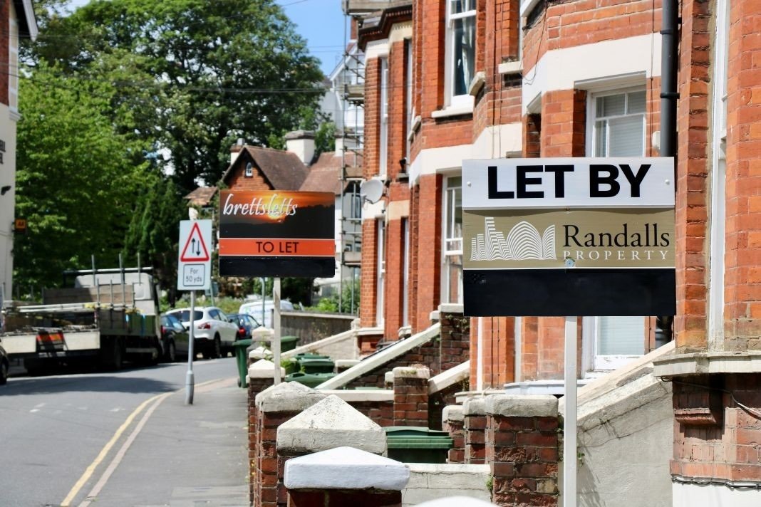 a row of houses in London that are up for let