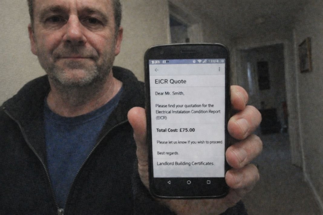 2. an ai photo of a landlord standing in a rental property hallway holding a phone with an EICR quote email open